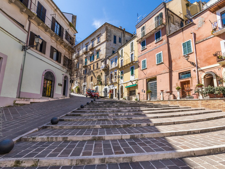 Chieti, Abruzzo, the wide staircase behind the new arch of Porta Pescara, climbing up to the old one.