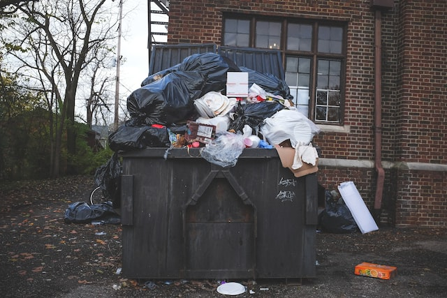 an abandoned waste bin